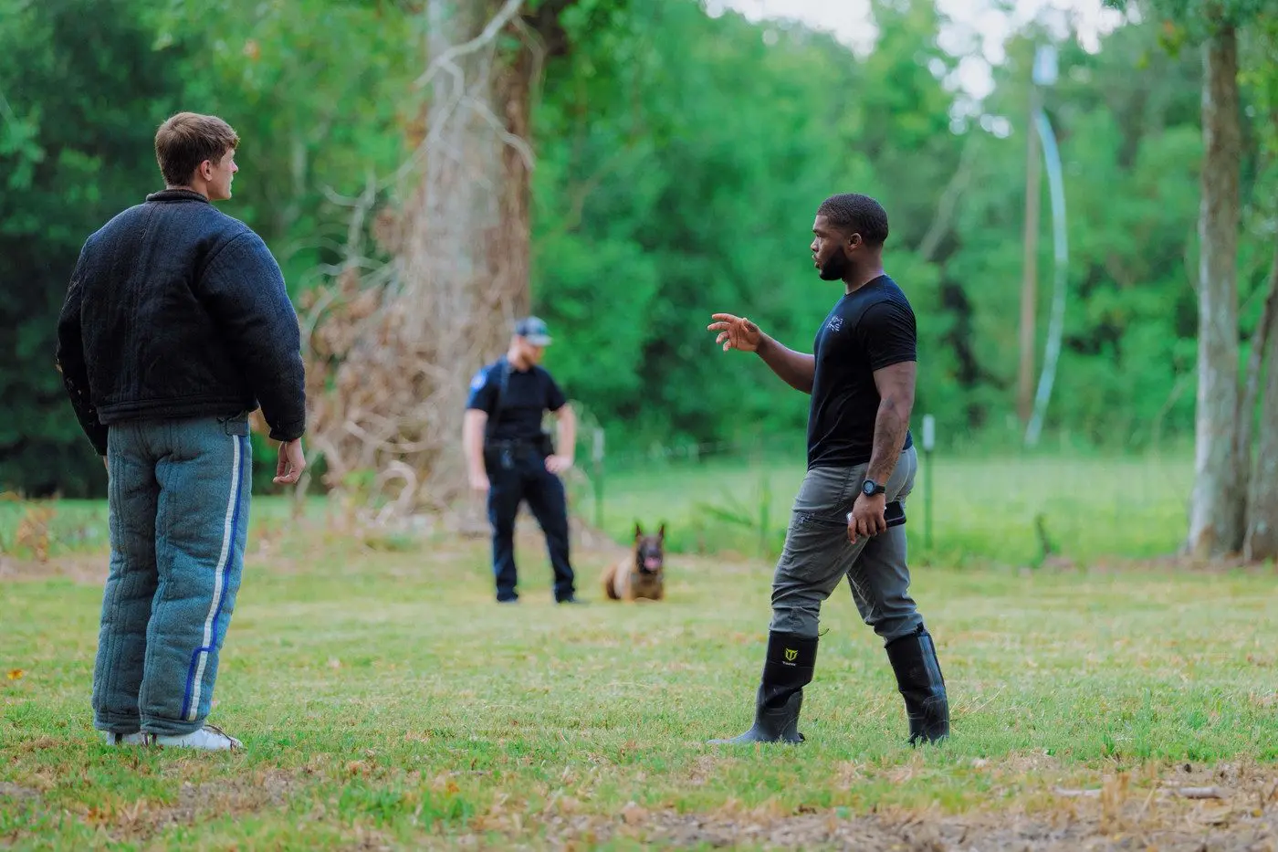 Walter Bell coaching a handler during a K9 training session